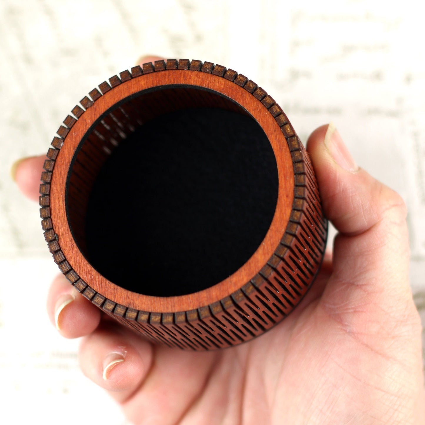 Small wooden trinket box with entwined hearts lid.