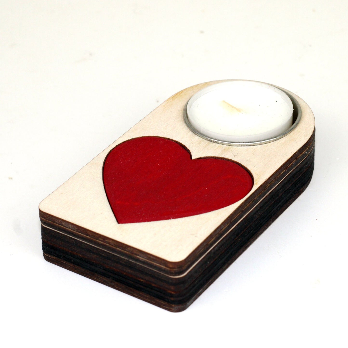 Engraved wooden candle holder with red heart motif and secret compartment, it holds tea light candle or nightlight