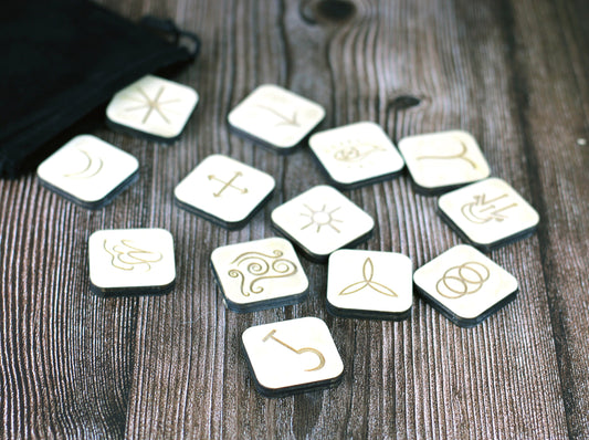 Engraved wooden witch's rune set with velvet bag
